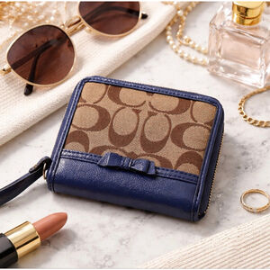 Coach Blue Patent Leather Zip Around Wallet Signature C Canvas Bow Wristlet